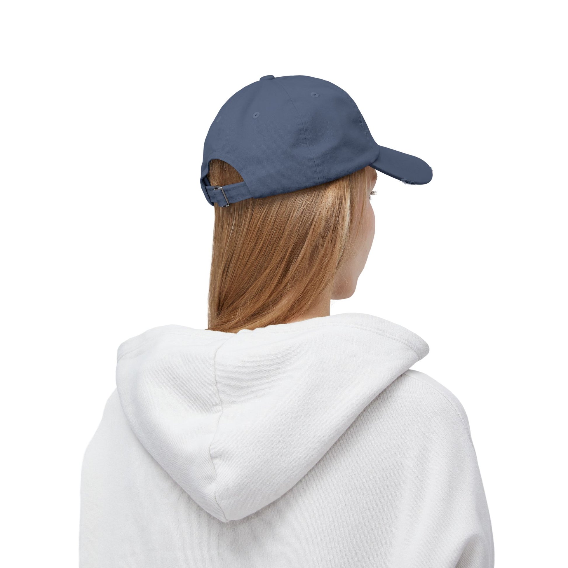 Side/back view of blue pigment-dyed L.I.F.E. dad hat showing adjustable fabric strap and metal D-ring.
