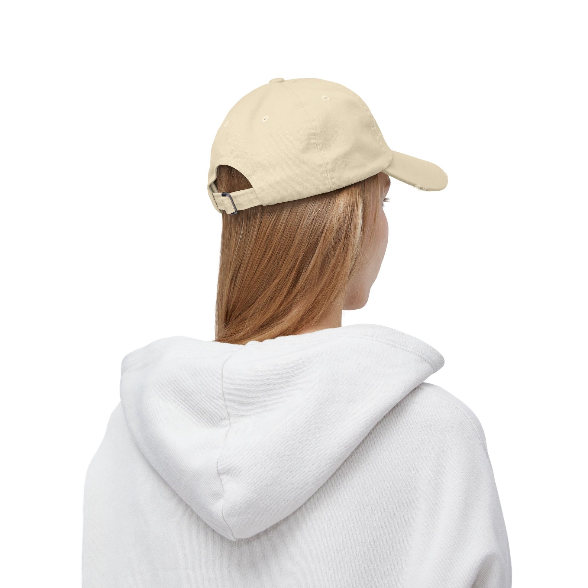 Side/back view of stone pigment-dyed L.I.F.E. dad hat showing adjustable fabric strap and D-ring.