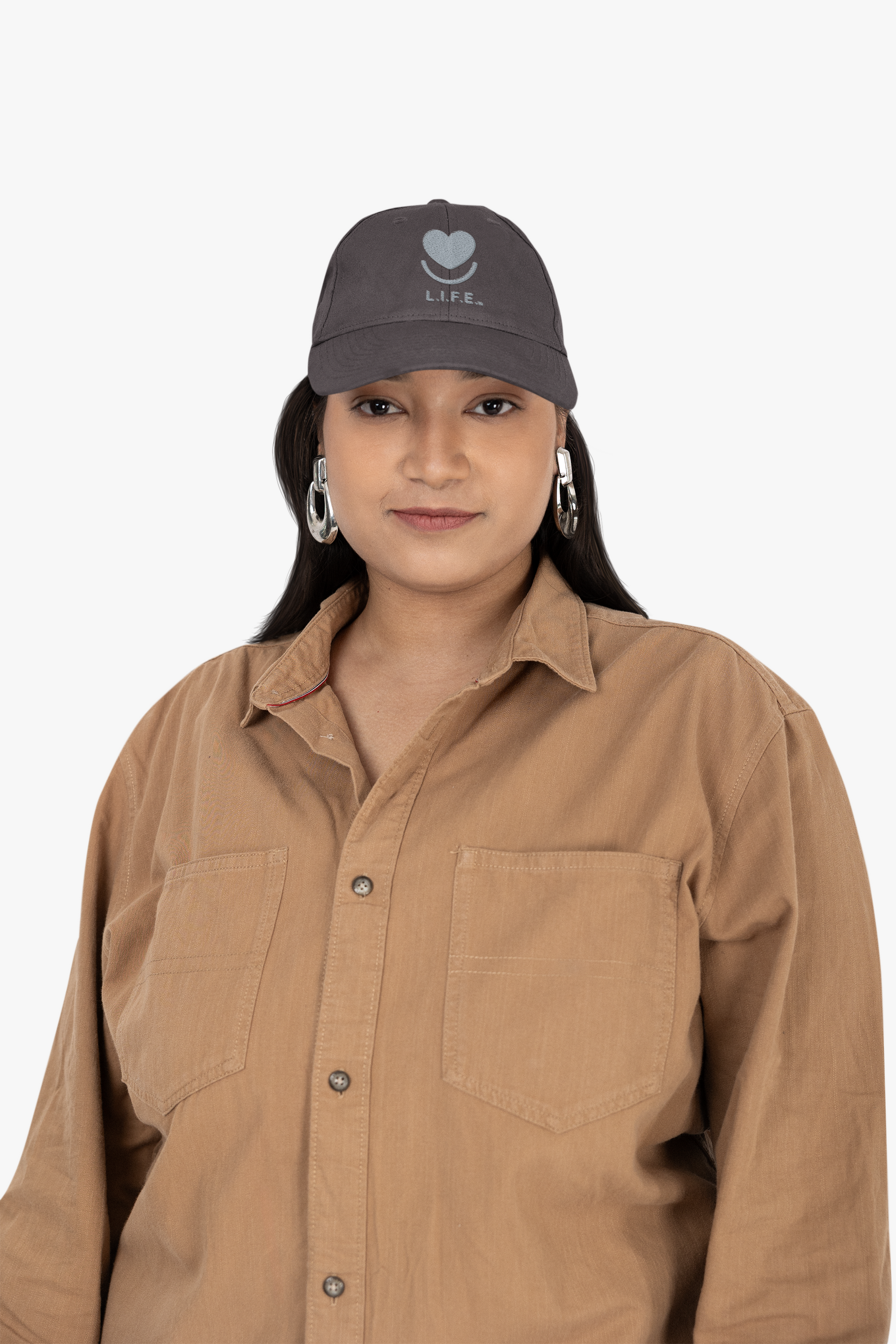 Woman wearing dark grey L.I.F.E.tonal dad hat styled with oversized shirt.