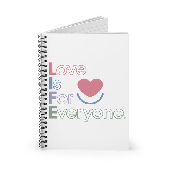 Angled view of L.I.F.E. Color Pop spiral notebook showing ruled pages and metal binding.