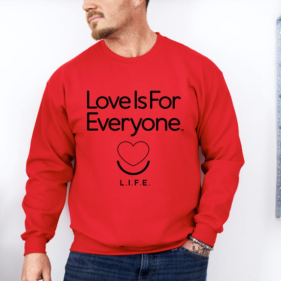 Man wearing men's Classic Crewneck sweatshirt in red, front view with signature L.I.F.E. artwork.
