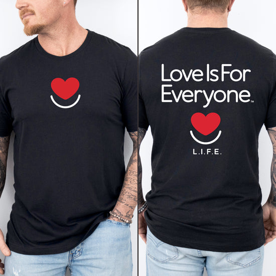 Man wearing men's Signature Tee in black, front and back "Love is for Everyone" Design.