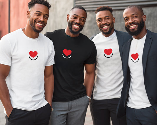 Four men standing together wearing Classic Tees with a red heart smile logo and "Love is for Everyone" design.