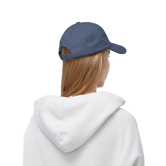 Side and back view of blue pigment-dyed L.I.F.E. dad hat showing adjustable fabric strap and metal D-ring.
