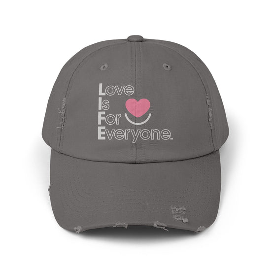 Front view of nickel L.I.F.E dad hat with heart logo and message.
