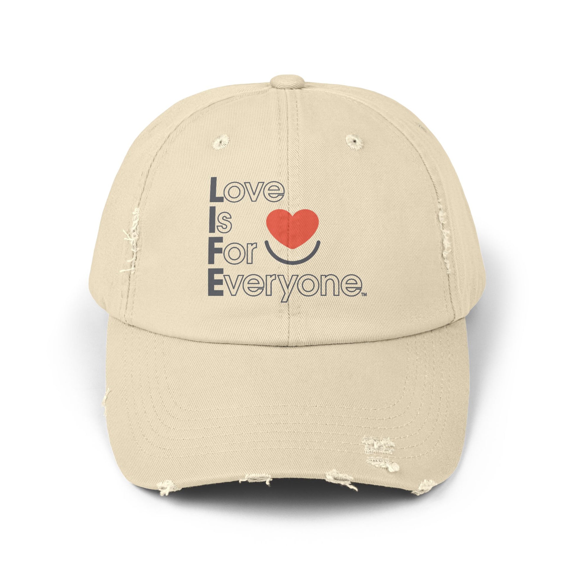 Front of stone distressed cotton twill L.I.F.E. dad hat with printed heart logo and message.