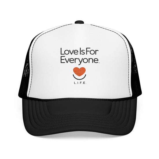 Front view of black and white L.I.F.E. trucker hat with embroidered message and heart logo.