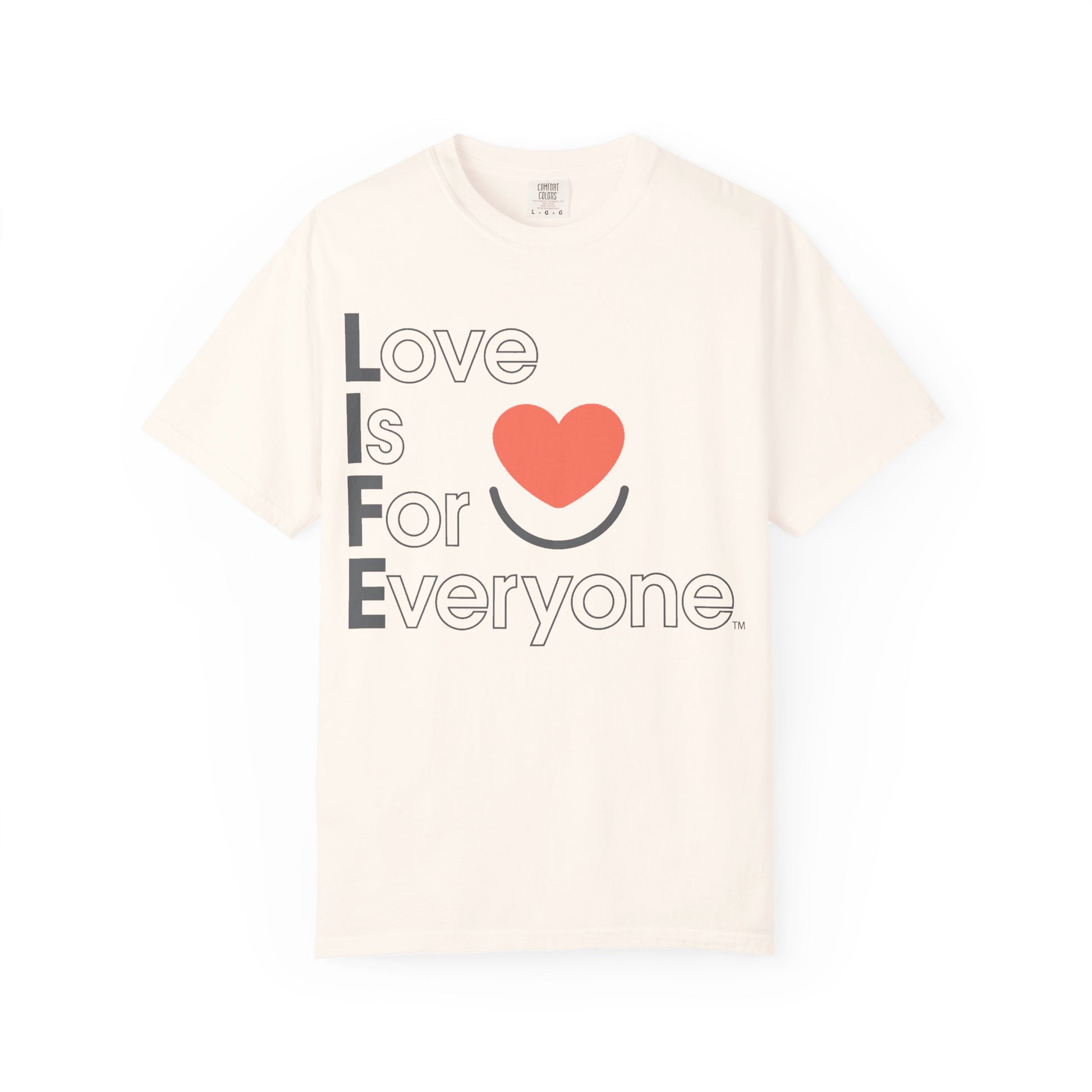 Ivory Comfort Colors® t-shrit laid flat with vertical "Love is for Everyone" heart design.