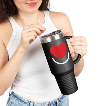 Woman holding black 40oz insulated travel mug with our red heart smile logo design.