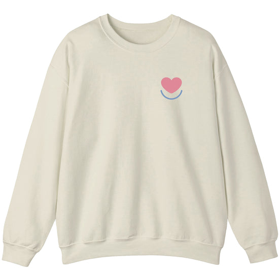 Men's Color Pop crewneck sand sweatshirt, laid flat with heart smile logo on left chest.