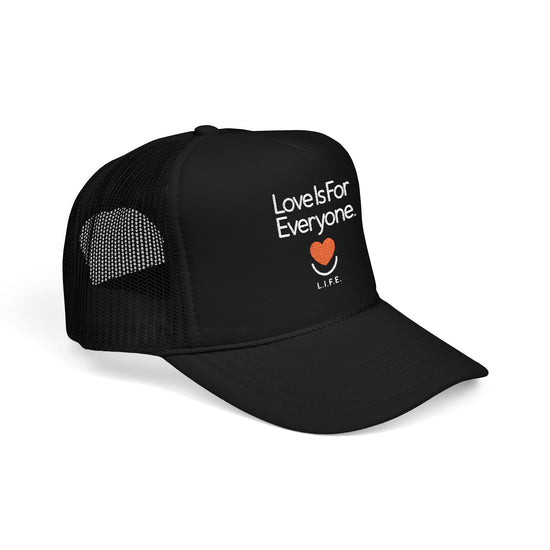 Angled view of black embroidered L.I.F.E. trucker hat highlighting six-panel build.