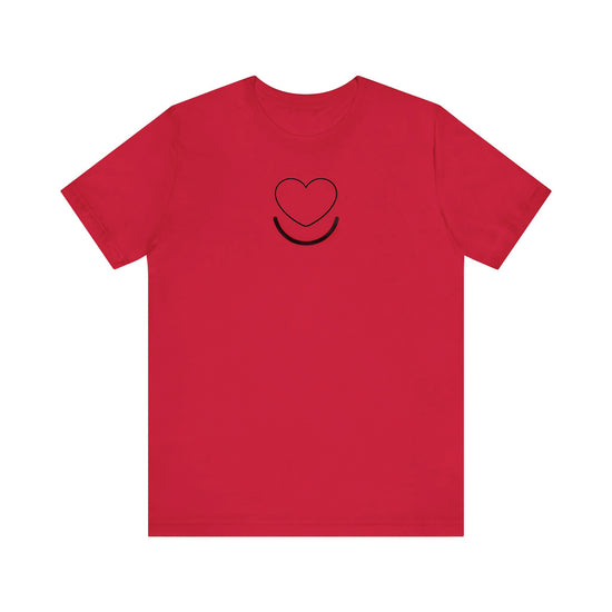 Women’s Signature Tee red laid flat with heart smile logo. 